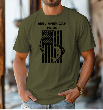Reel American Pride T-shirt featuring a bold fishing-themed design with the phrase 'Reel American Pride' above an American flag graphic. A large fish is hooked on a fishing line overlaying the flag’s stripes. Printed on a classic hemp color unisex tee, this patriotic fishing shirt is perfect for anglers who love both their country and the sport. Ideal for summer outings, fishing trips, or casual everyday wear.