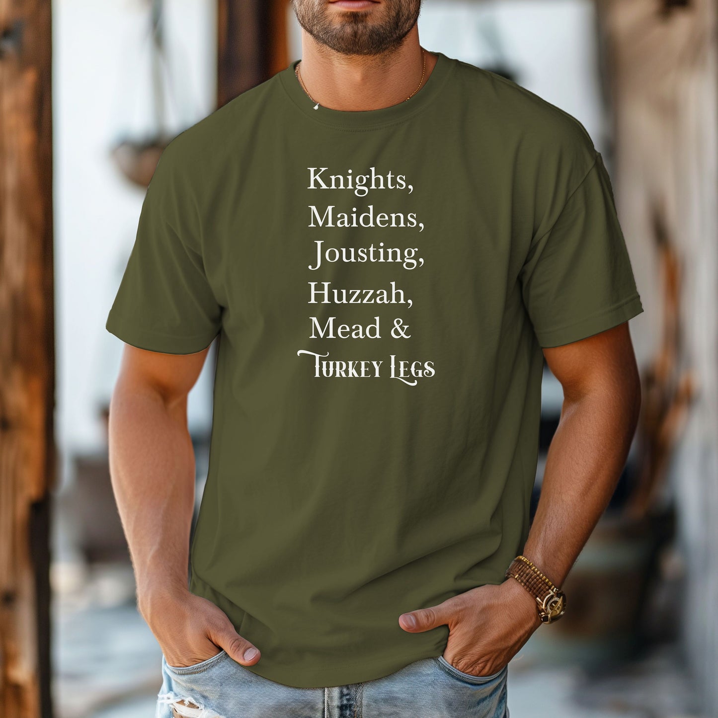 Person wearing a Hemp color Renaissance Faire-themed T-shirt featuring a playful list-style text: “Knights, Maidens, Jousting, Huzzah, Mead & Turkey Legs.” The design uses elegant medieval-inspired fonts to celebrate classic faire experiences, perfect for fairgoers who love the festive mix of tradition, adventure, and hearty food.