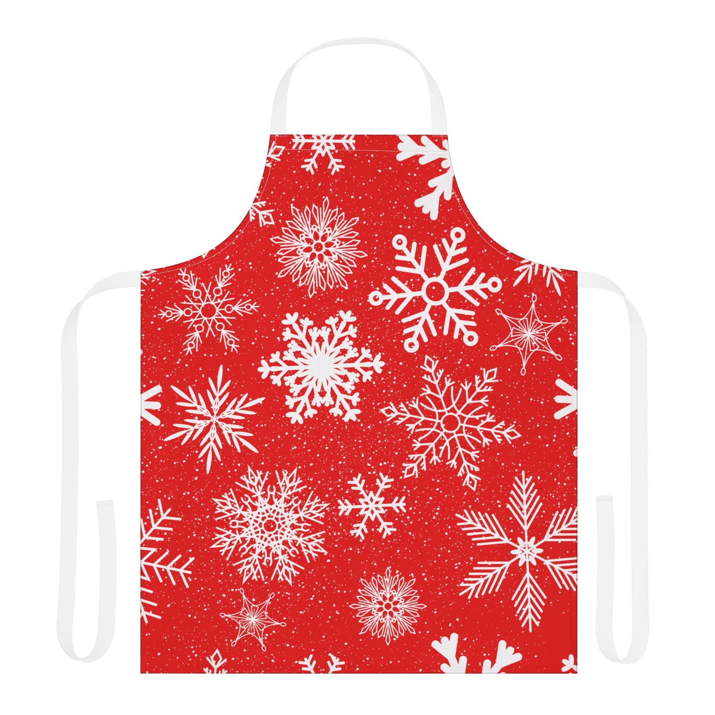 Apron with a festive red background covered in white snowflakes, creating a cheerful winter and Christmas-inspired design for holiday cooking.