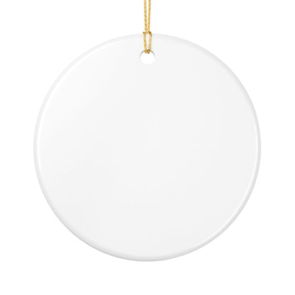 Back of white ceramic ornament with gold cord on a white background