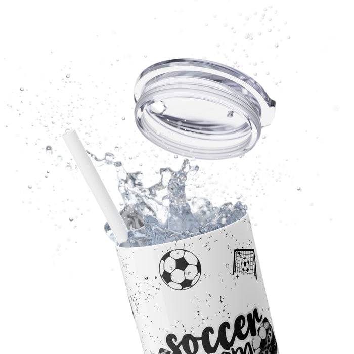 Soccer Mom Skinny Tumbler – 20 oz featuring a black-and-white coquette bow made of soccer balls with a leopard print accent. Surrounded by small soccer ball and goal illustrations on a speckled background, this stylish and durable tumbler is perfect for keeping drinks hot or cold. A fun and practical accessory for proud soccer moms to show their team spirit during practices, games, and everyday use.