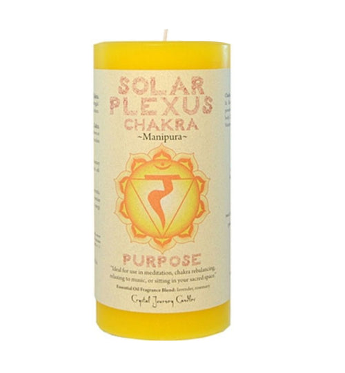 Solar Plexus Chakra pillar candle labeled "Manipura" with yellow wax and chakra symbol. Features the word “Purpose” and is ideal for meditation, chakra rebalancing, or relaxing in a sacred space. Infused with a lavender and rosemary essential oil blend, this Crystal Journey Candle supports personal power and self-confidence.