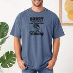 SORRY I wasn’t listening. I was thinking about Fishing' T-shirt featuring bold and script fonts with a detailed fish illustration. Printed on a blue jean unisex tee, this humorous design is perfect for fishing enthusiasts who’d rather be on the water than anywhere else. Ideal for casual wear, fishing trips, or as a fun gift for anglers and dads who love the sport.