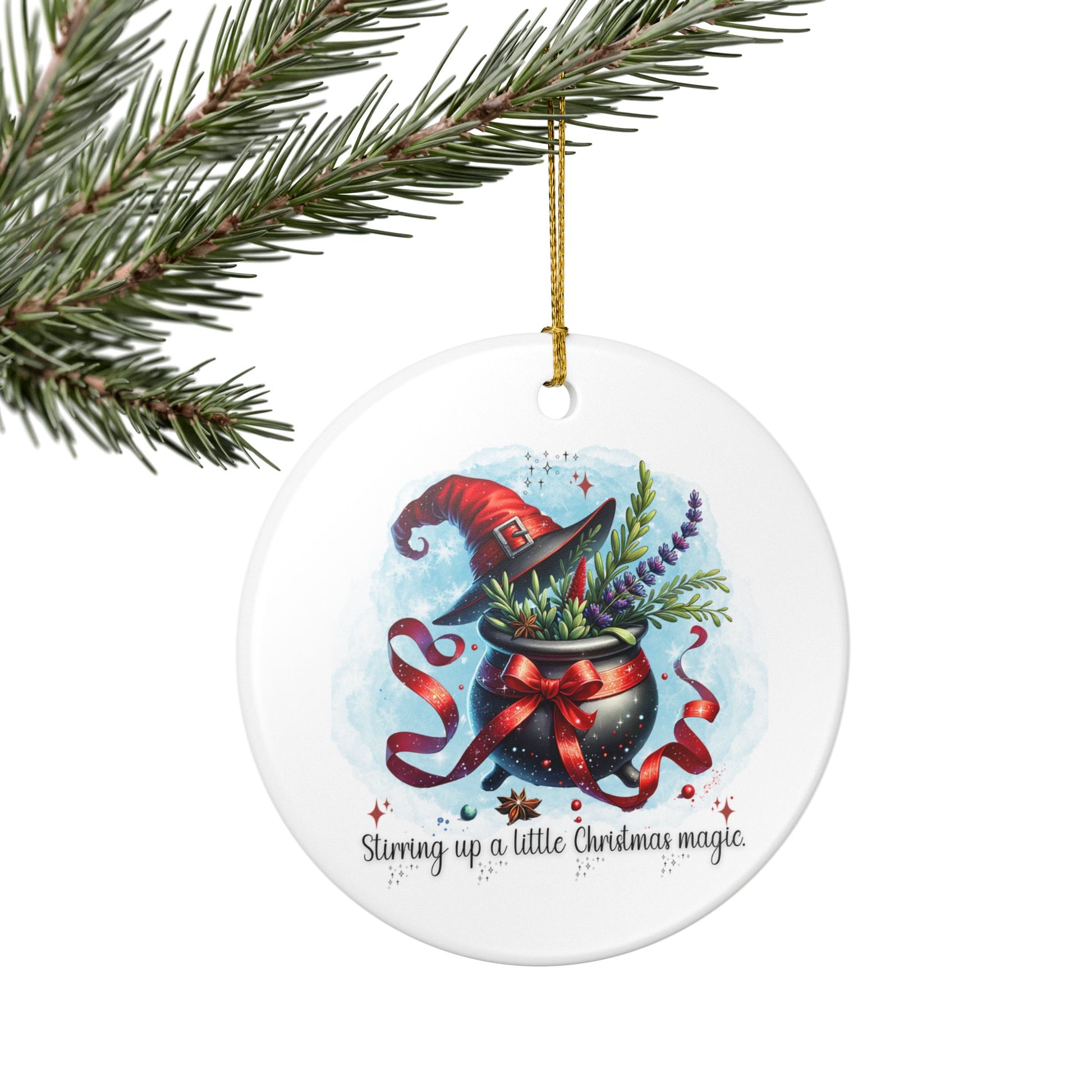 Christmas ornament with a witch's hat and cauldron design on a white background