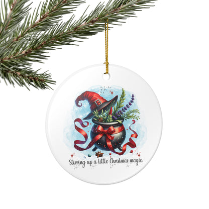 Christmas ornament with a witch's hat and cauldron design on a white background