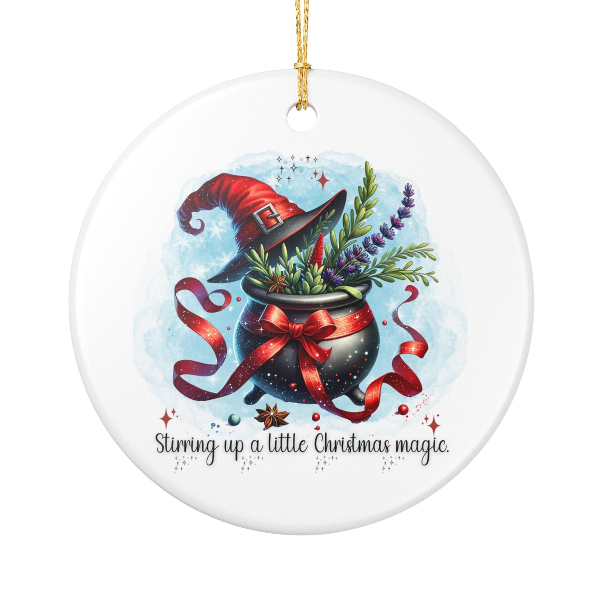 Ceramic ornament with a witch's hat, cauldron, and plants on a white background