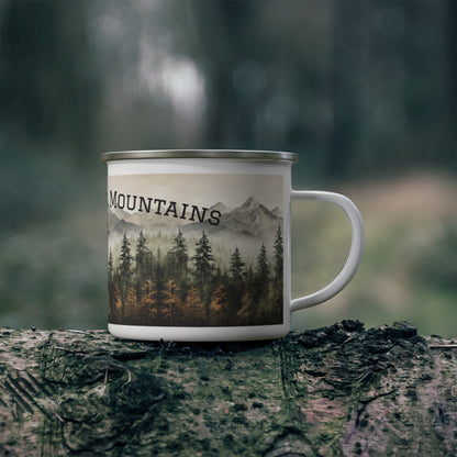 Enamel Mug with mountain and forest design on a log in a forest setting