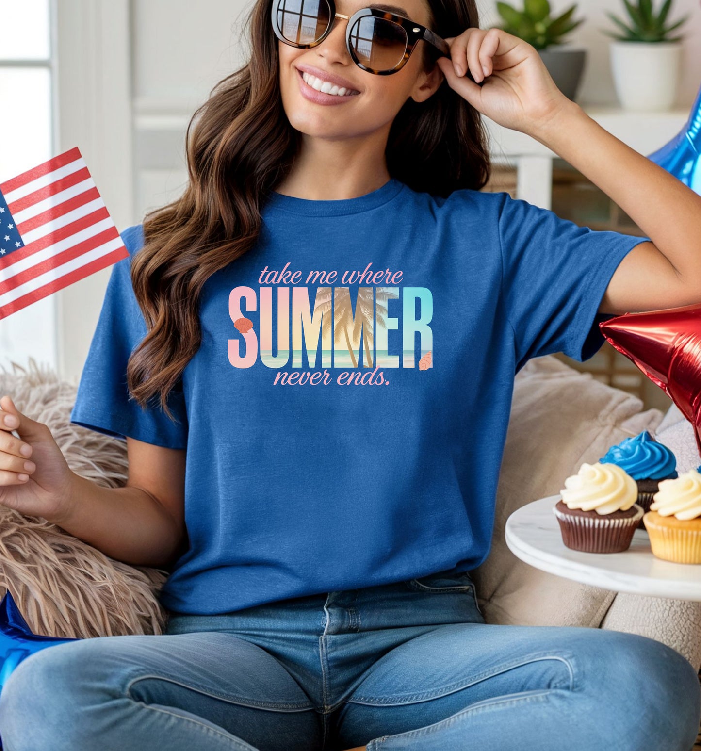 Columbia Blue T-shirt featuring the text “Take me where summer never ends” with the words “take me where SUMMER never ends”.  SUMMER is filled with a tropical beach scene including palm trees, seashells, and ocean waves. Perfect for beach lovers and summer enthusiasts, this vibrant vacation-themed shirt captures a fun, sunny vibe for casual outings, travel, or coastal adventures.