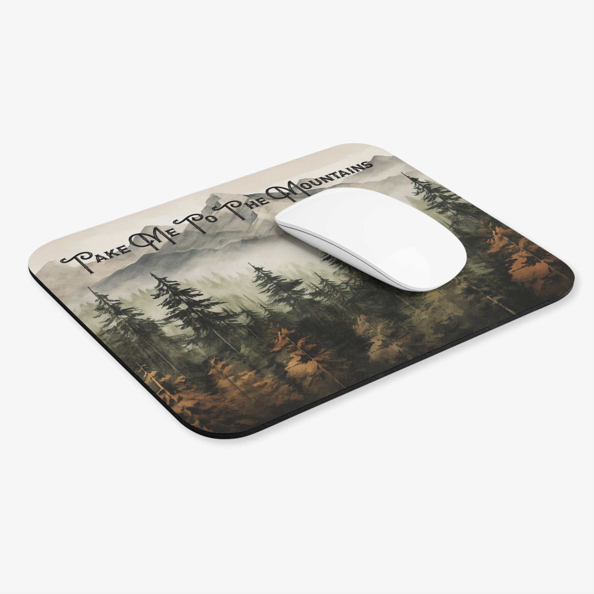 Mouse pad with nature design and 'Take Me to the Mountains' text, featuring a mouse on top.