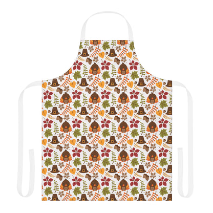 Apron with a festive Thanksgiving pattern featuring turkeys, pilgrim hats, fall leaves, and autumn colors, perfect for holiday cooking and baking.