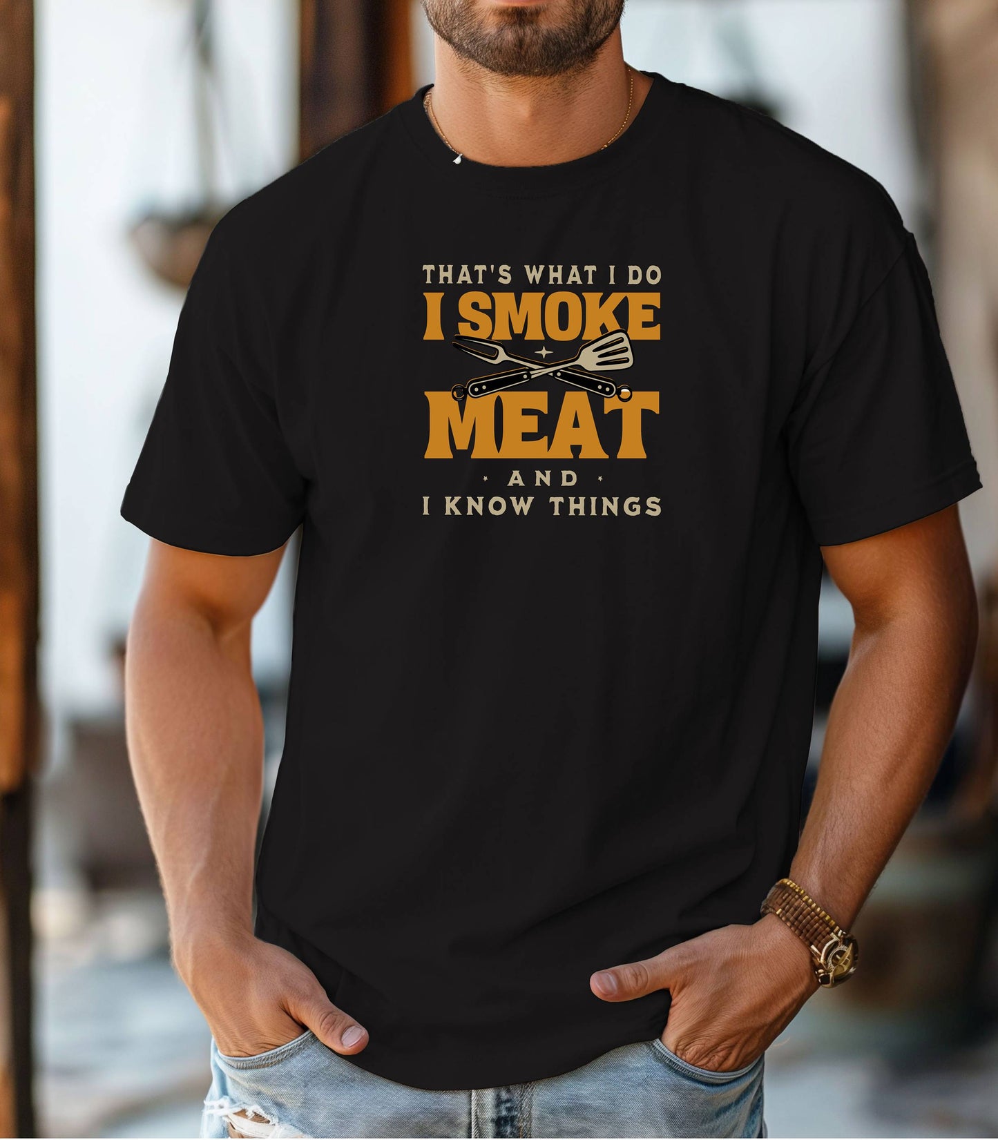 That's What I Do, I Smoke Meat & I Know Things T-shirt featuring bold text in yellow and white with crossed grilling tools at the center. Printed on a black unisex tee, this fun BBQ-themed design is perfect for grill masters and smoking enthusiasts. Ideal for Father’s Day, cookouts, and casual wear for those proud of their grilling skills and witty sense of humor.