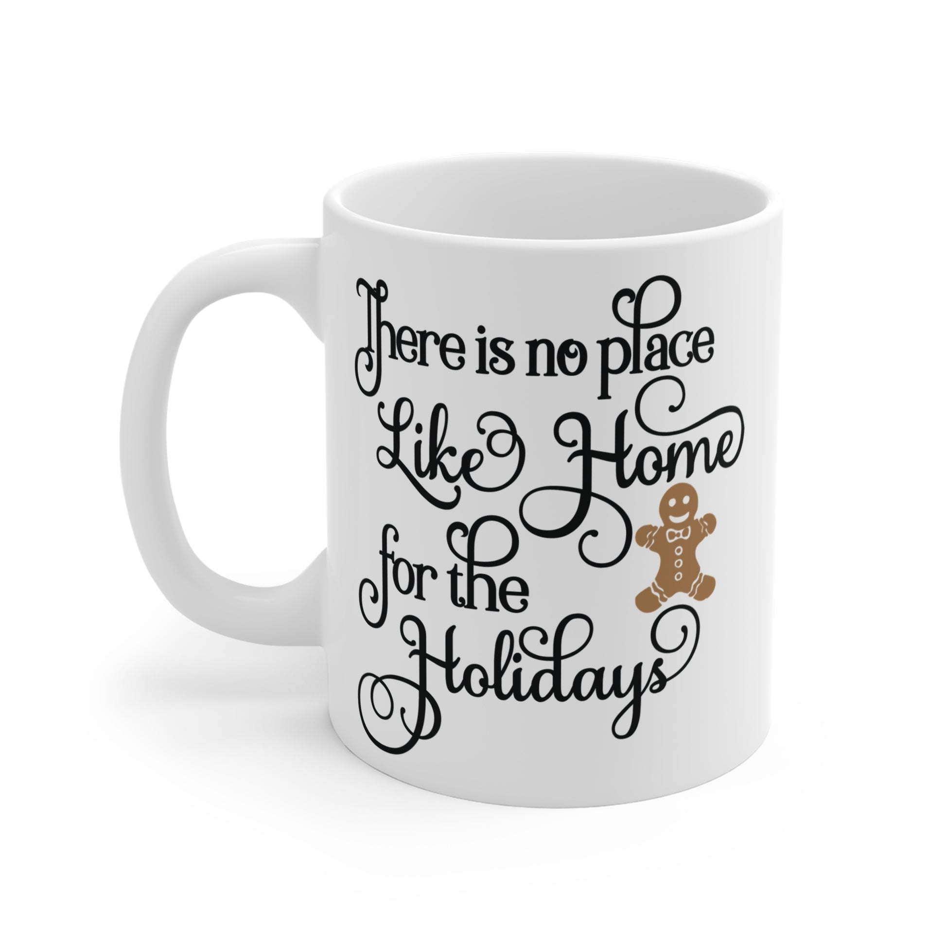 White ceramic mug with text 'There is no place like home for the holidays' and a gingerbread man on a white background
