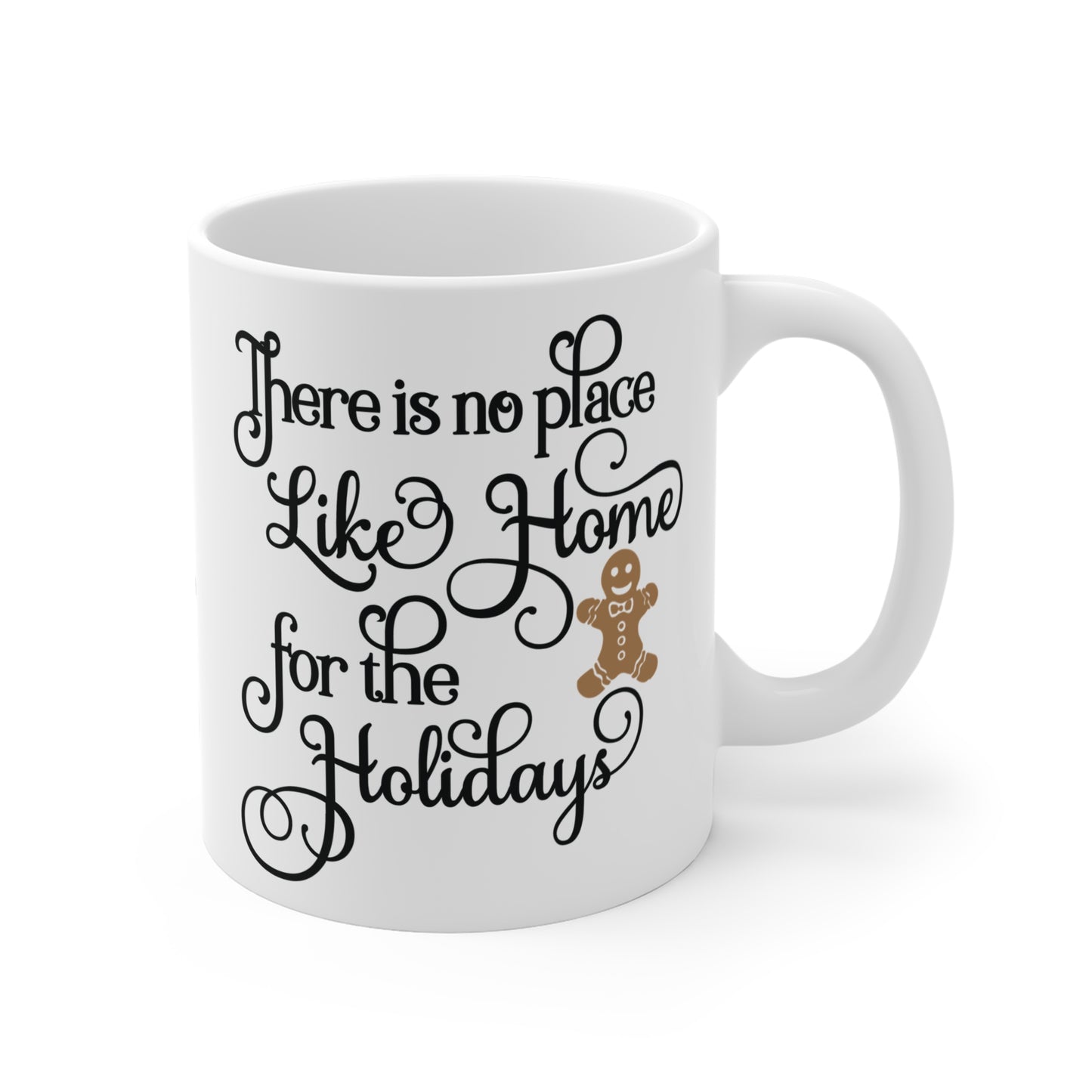 White ceramic mug with black text and a gingerbread man on a white background