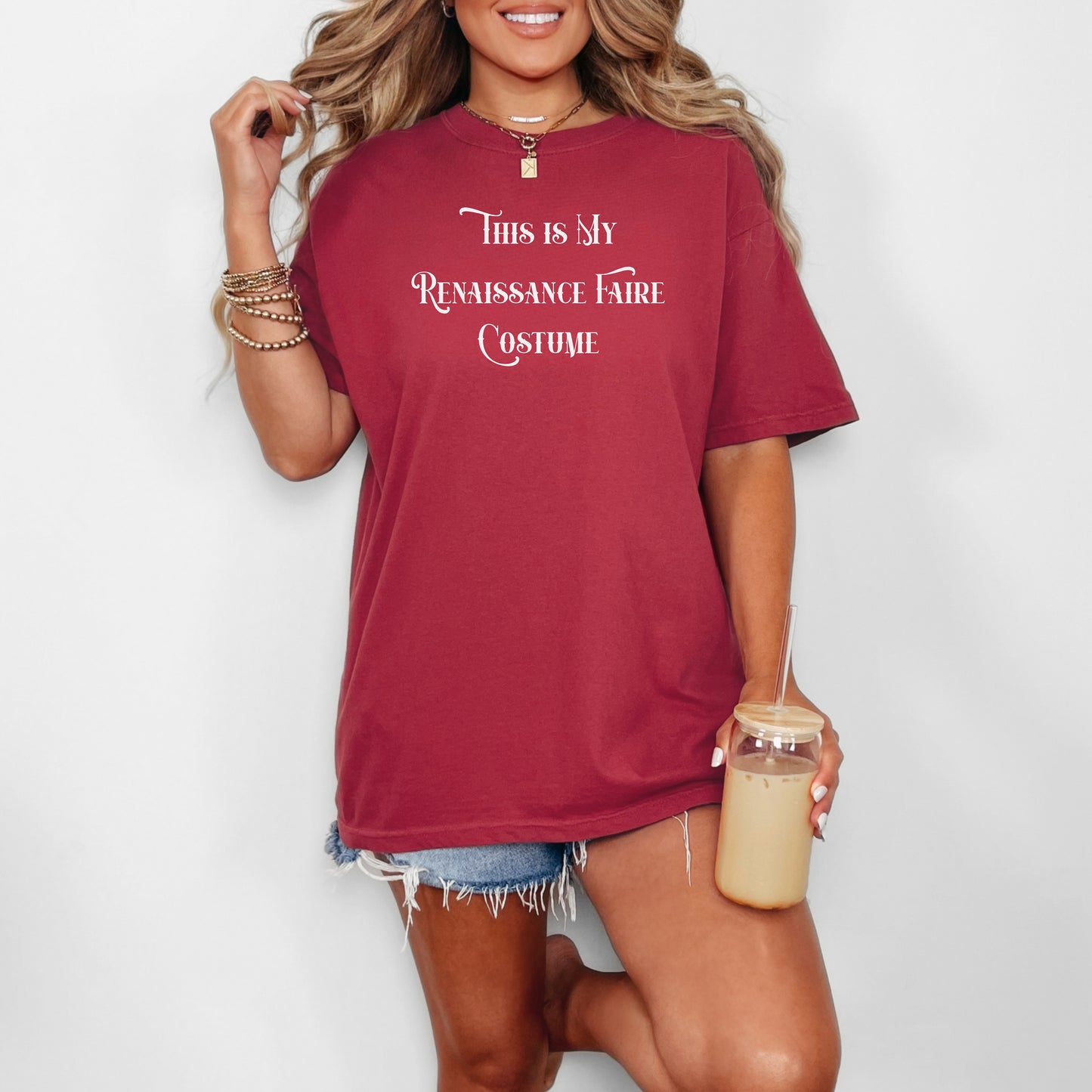 Chili T-shirt featuring the humorous phrase “This Is My Renaissance Faire Costume” in an elegant medieval-style font. Perfect for fairgoers who prefer a simple, casual outfit while enjoying the festivities, jousting, and entertainment at a Renaissance Faire. Ideal for fans of witty, themed apparel.