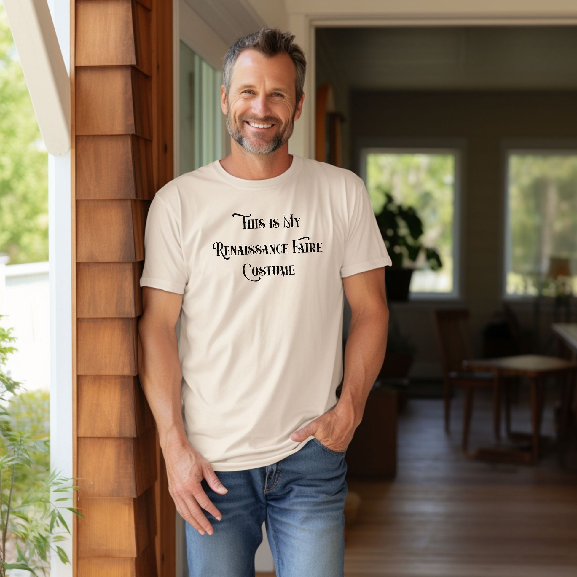 Ivory T-shirt featuring the humorous phrase “This Is My Renaissance Faire Costume” in an elegant medieval-style font. Perfect for fairgoers who prefer a simple, casual outfit while enjoying the festivities, jousting, and entertainment at a Renaissance Faire. Ideal for fans of witty, themed apparel.