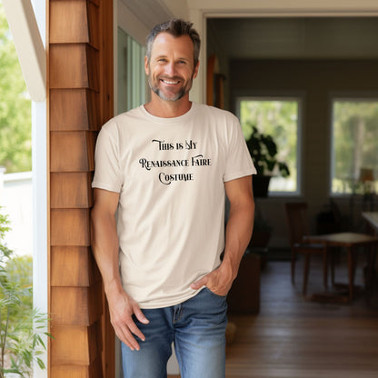 Ivory T-shirt featuring the humorous phrase “This Is My Renaissance Faire Costume” in an elegant medieval-style font. Perfect for fairgoers who prefer a simple, casual outfit while enjoying the festivities, jousting, and entertainment at a Renaissance Faire. Ideal for fans of witty, themed apparel.