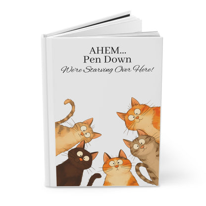 Book cover with cartoon cats and humorous text on a white background open