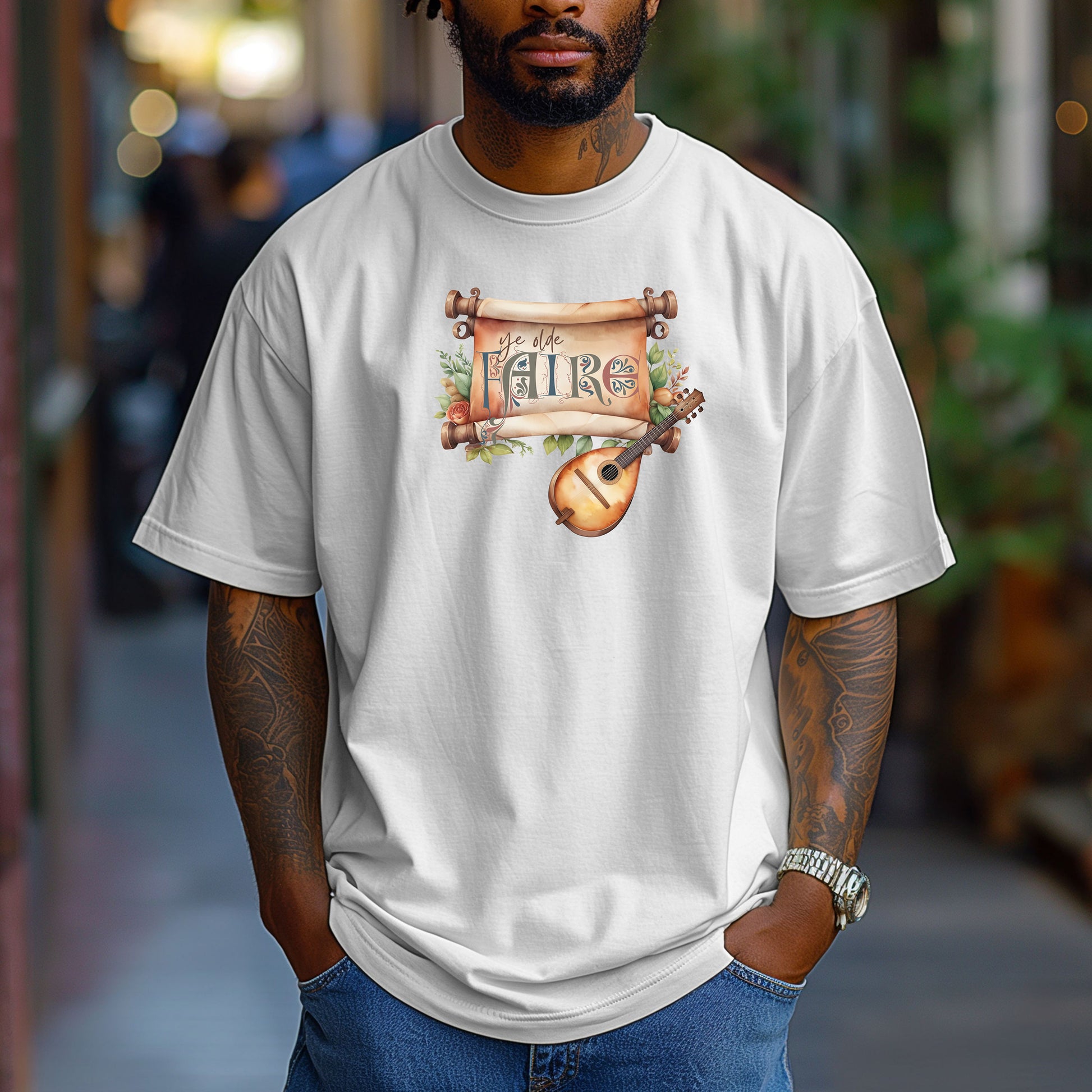White T-shirt featuring a whimsical Renaissance Faire design with the words “Ye Olde Faire” written on a scroll accented by flowers and greenery, alongside a medieval-style lute. Perfect for festival goers, music lovers, and fans of historical fairs, knights, and old-world charm.