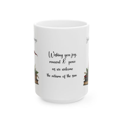 White ceramic mug with Yuletide Blessings, books and witch's hat on a white background