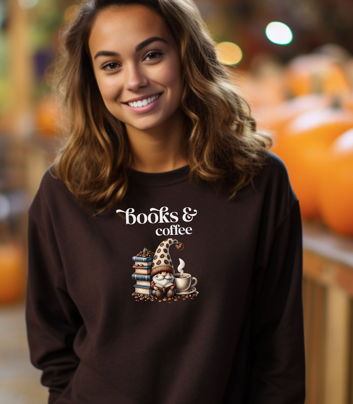 Dark chocolate Gildan sweatshirt featuring an adorable “Books & Coffee” design with a cozy gnome wearing a polka-dot hat, sitting beside a stack of books, a steaming coffee cup, and scattered coffee beans. A charming and whimsical design perfect for book lovers, coffee enthusiasts, and fall vibes.